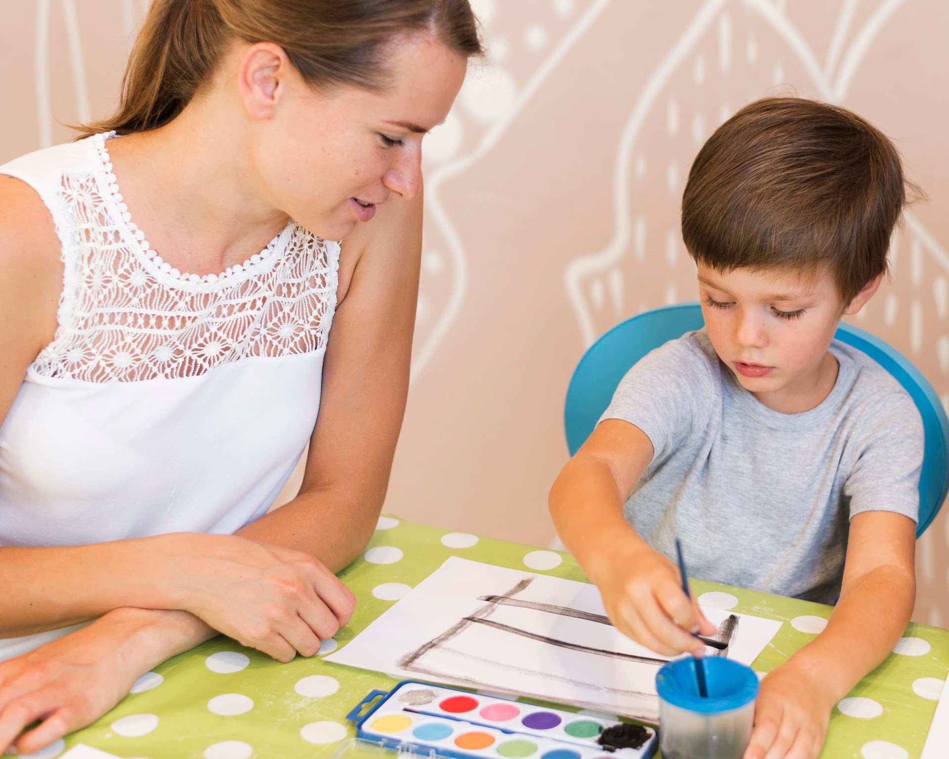 medium-shot-kid-painting-table